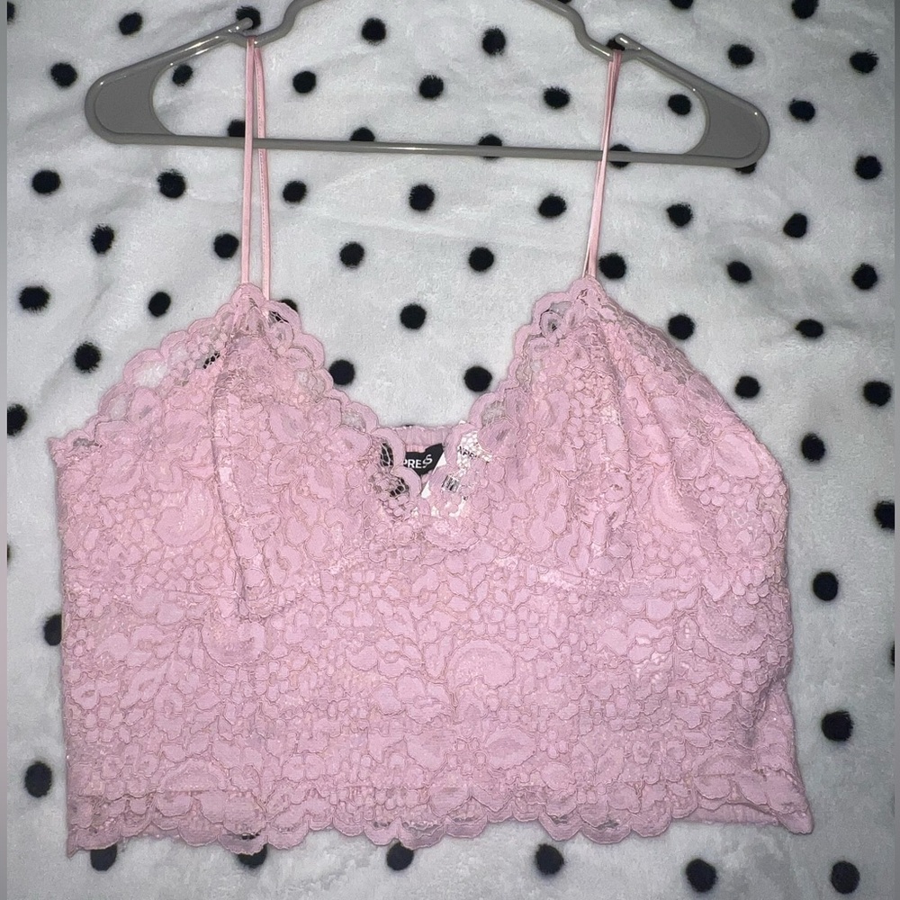 Cute lacy pink cami with spaghetti straps.